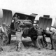 Soldiers unload a Jeep from the cargo doors of a C-47 somewhere in France during WWII (US Army)